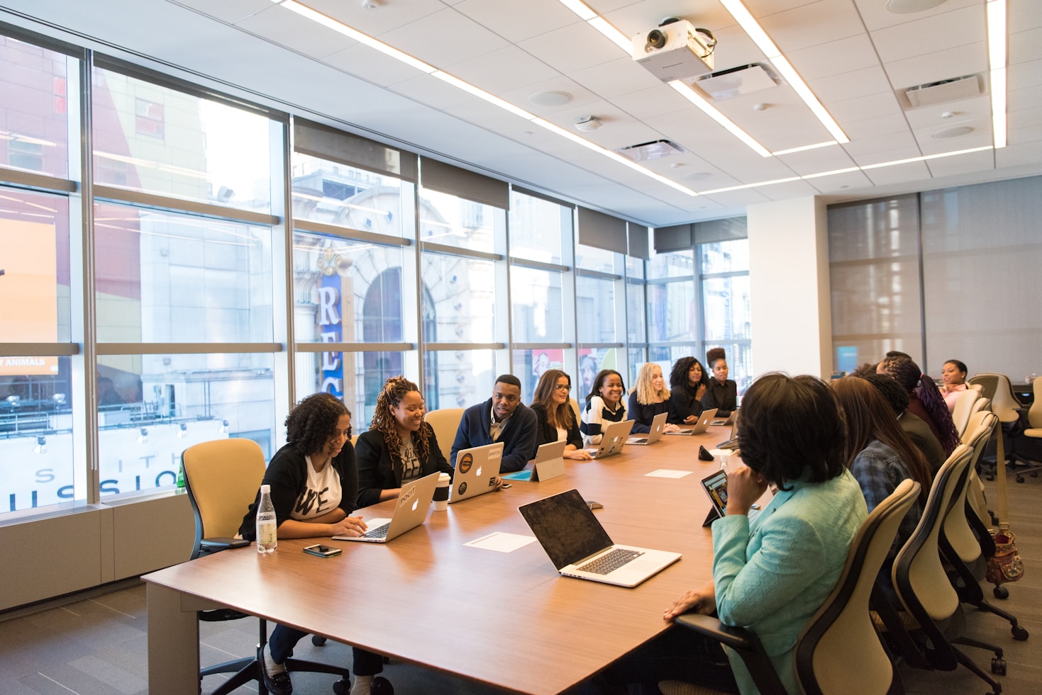 Fideco team collaborating in a modern boardroom